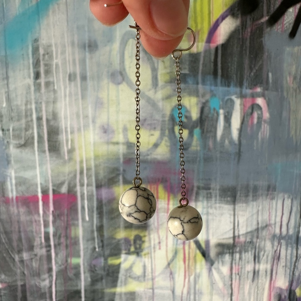 Long chain marble looking earrings 
Excellent condition